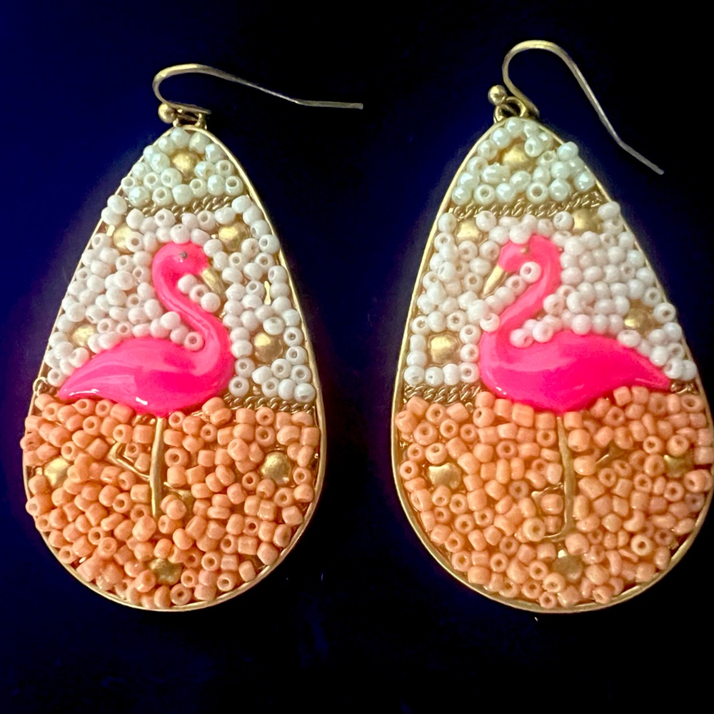 New Metal Earrings with beautiful detail of seed beads, along with a flamingo.